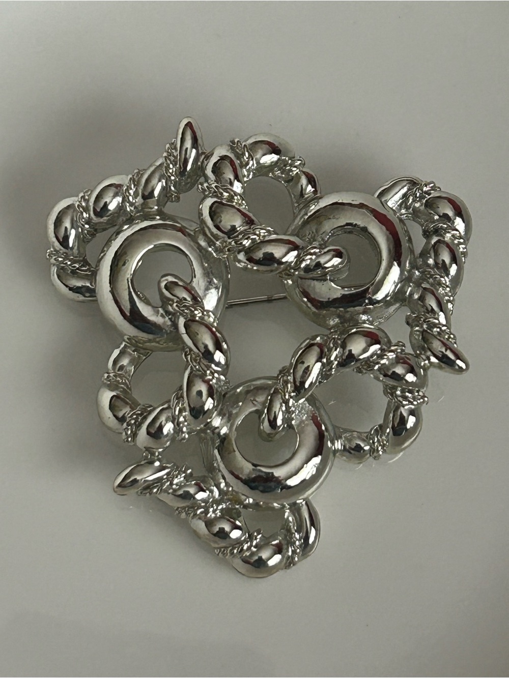 Vintage Bogoff silver plated modernist abstract rope design brooch. Signed.